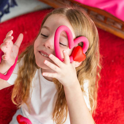 OLI &CAROL - X ARP THE HEART TEETHER (Not available for toy library)